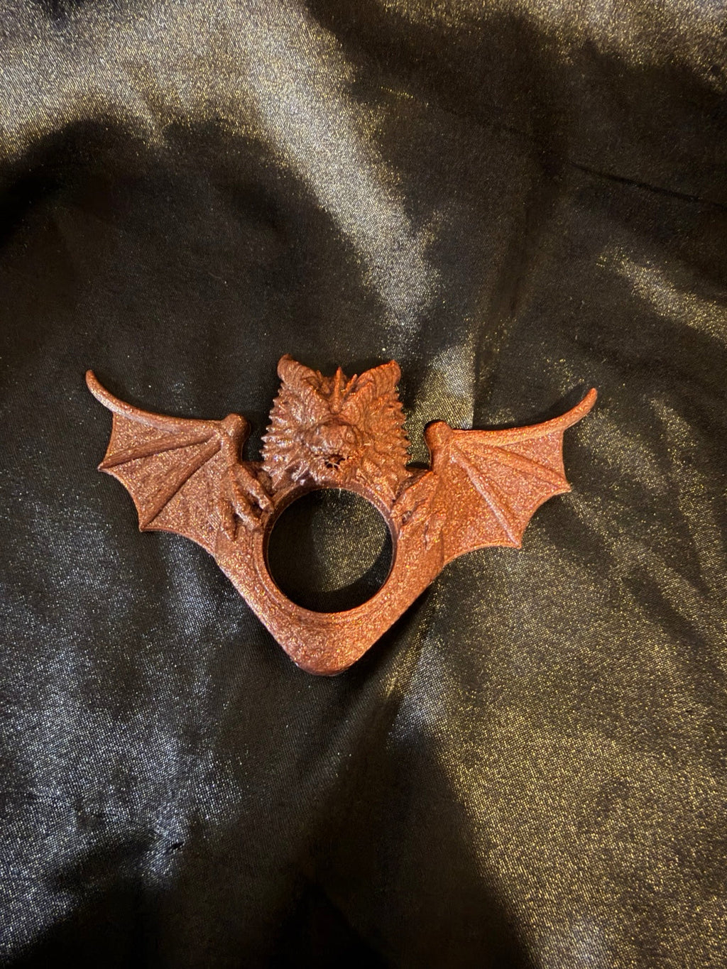 Bronze dragon thumb page holder front view