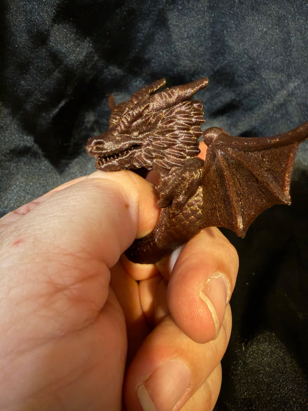 Bronze dragon thumb page holder side detail