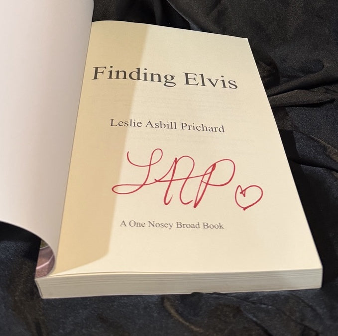 Author-signed title page of Finding Elvis