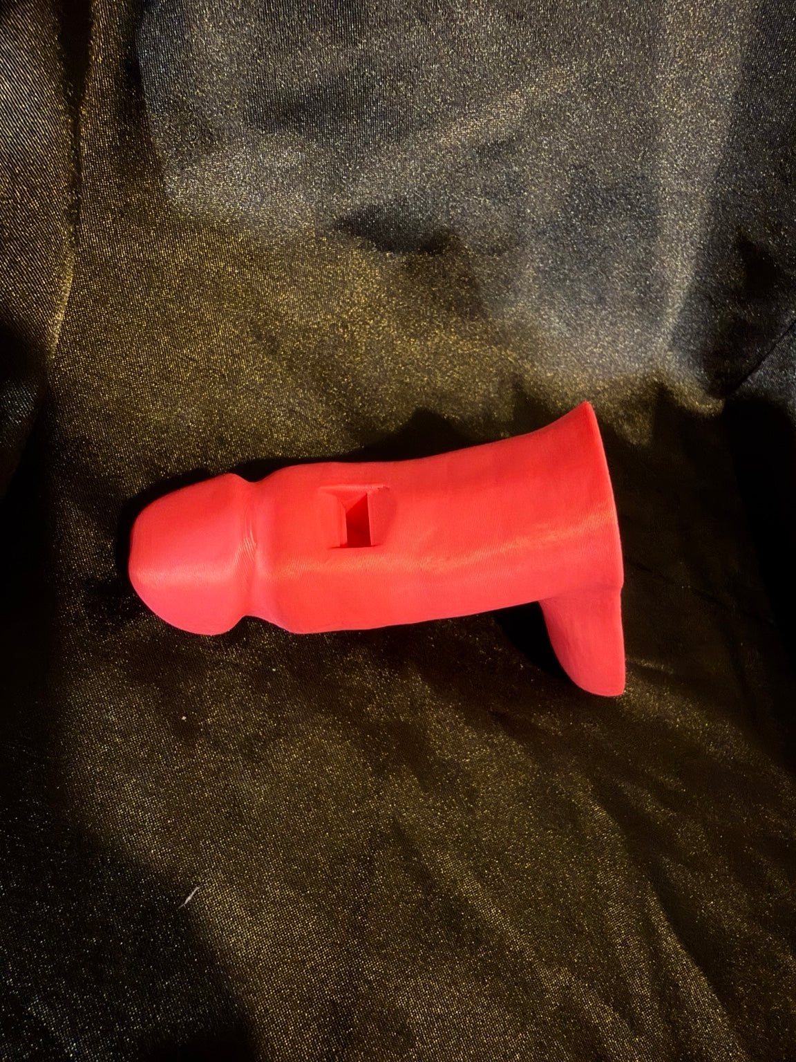 Pink novelty penis whistle side